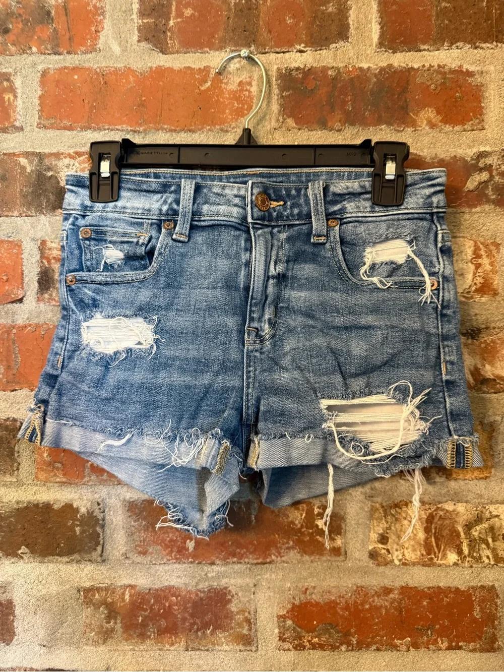 P125 - American Eagle Outfitters Distressed Light Blue Denim Cutoff Shorts